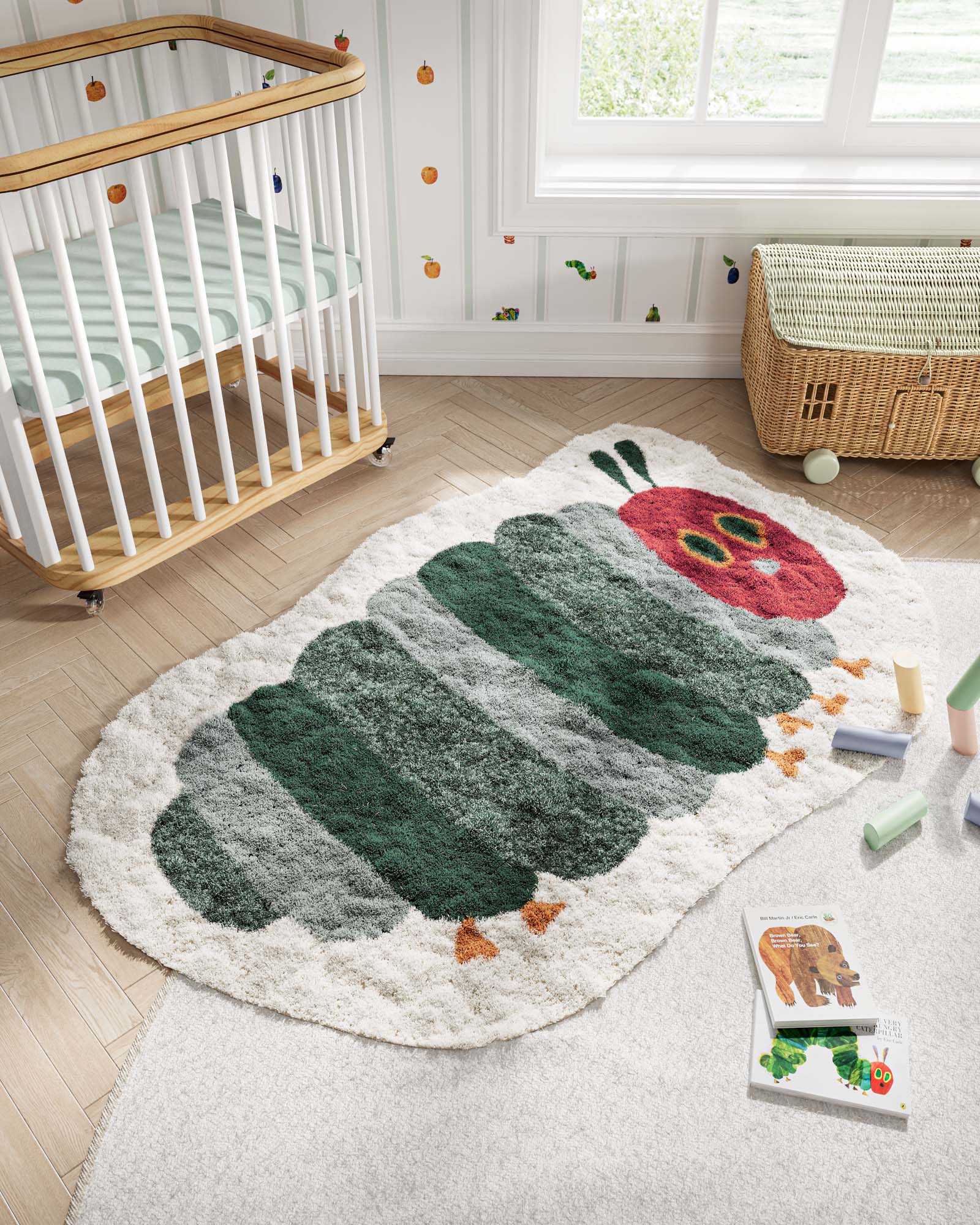 Children's room with a crib, a rug featuring a caterpillar design, a wicker basket, and some blocks on the floor.
