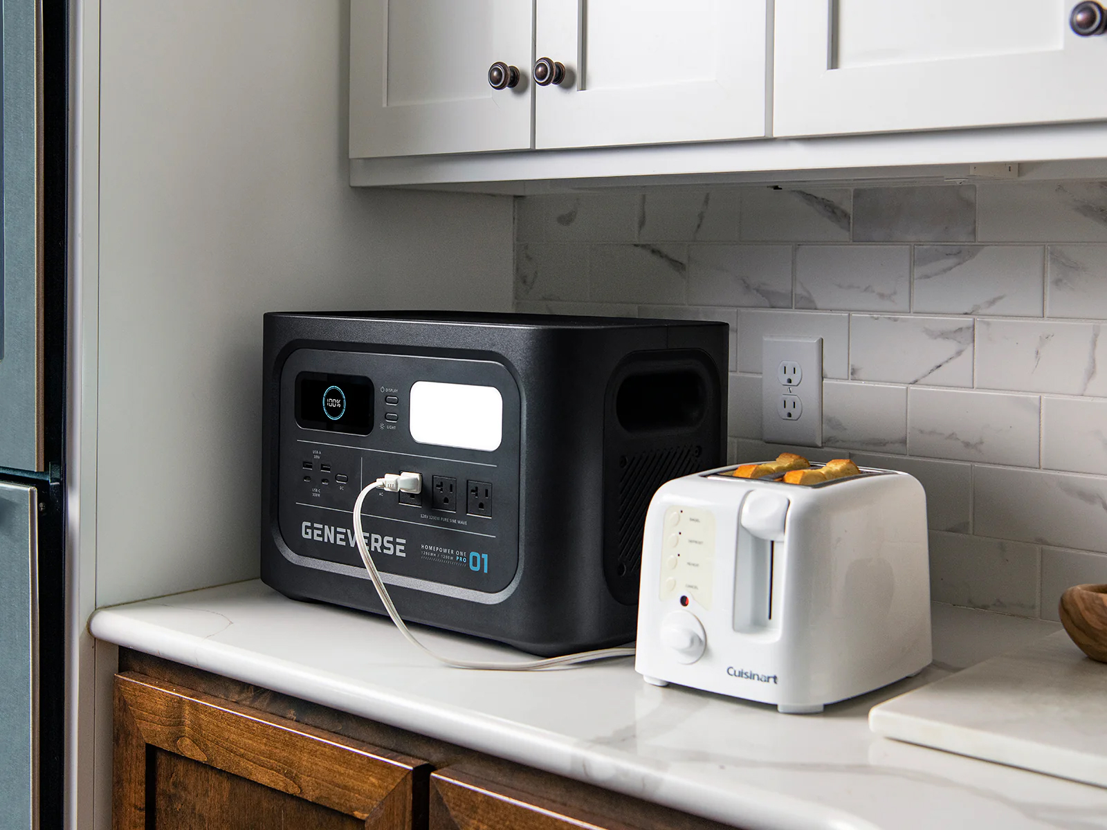 A Geneverse solar generator sitting on a kitchen counter.