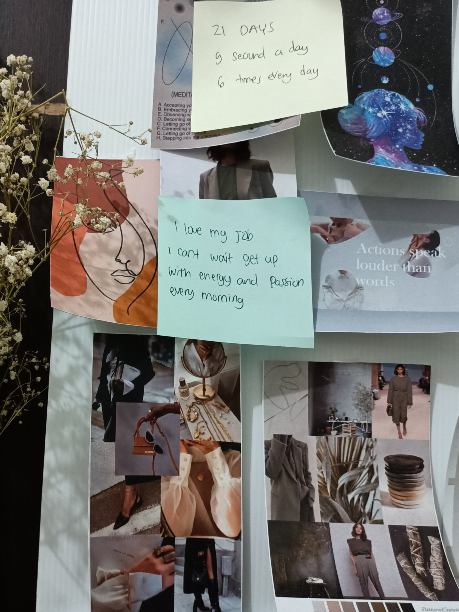 A collage board with fashion images, abstract art, dried flowers, and handwritten sticky notes with motivational messages and daily goals.